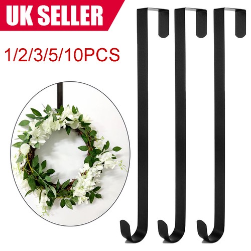 Floral wreath hanger over - wreath,